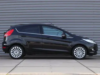 Foto 14 van Ford Fiesta 1.25 Titanium *Klimaatreg.*Parkeersens.*