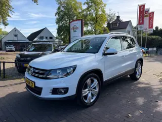 VOLKSWAGEN TIGUAN 1.4 TSI 150PK AUTOMAAT / SCHUIFDAK / NAVI / CAMERA / CRUISE CTR. / STOELVERW. / 19'' LM-VELGEN / TREKHAAK