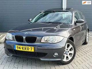 BMW 1-serie 120i Anniversary KOOPJE! AUTOMAAT 120i SCHUIFDAK RIJD SCHAKELT GOED CLIMA IJSKOUD