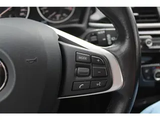 Foto 19 van BMW X1 sDrive20i Orange Edition II / 69.961 km / Trekhaak / Panoramadak / Camera / Head-up / Leder /