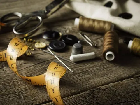 Kleding reparatie, coupeuse, naaister