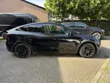 Foto 25 van Tesla Model Y Long Range AWD 75 kWh 92% SoH | Afn. Trekhaak | Autopilot | 1e Eigenaar BTW