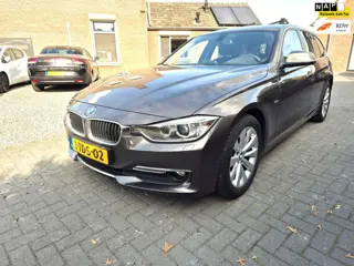 Foto 11 van BMW 3-serie Touring 316i Executive Upgrade Navi Clima Cruise