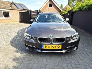 Foto 14 van BMW 3-serie Touring 316i Executive Upgrade Navi Clima Cruise