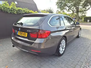 Foto 17 van BMW 3-serie Touring 316i Executive Upgrade Navi Clima Cruise