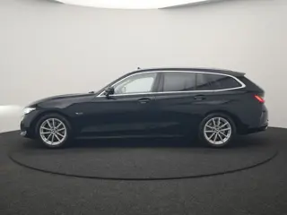 Foto 13 van BMW 3 Serie Touring 320e Luxury Line Facelift PHEV Dealer O.H. | Trekhaak Af Fabriek | Panodak | Hea
