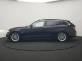 Foto 23 van BMW 3 Serie Touring 320e Luxury Line Facelift PHEV Dealer O.H. | Trekhaak Af Fabriek | Panodak | Hea
