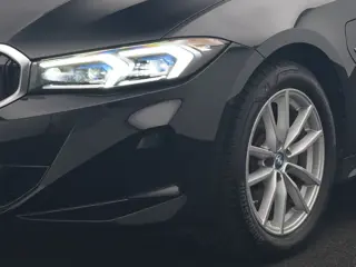 Foto 15 van BMW 3 Serie Touring 320e Luxury Line Facelift PHEV Dealer O.H. | Trekhaak Af Fabriek | Panodak | Hea