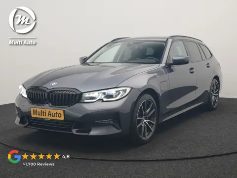 BMW 3 Serie Touring 320e xDrive Sportline PHEV 204pk Dealer O.H | Trekhaak Af Fabriek | Camera | Las
