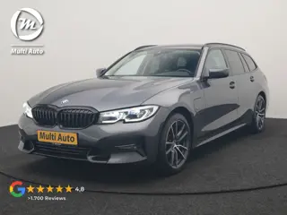 BMW 3 Serie Touring 320e xDrive Sportline PHEV 204pk Dealer O.H | Trekhaak Af Fabriek | Camera | Las
