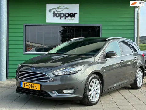 Ford Focus Wagon 1.0 Titanium|Automaat|D-riem v.v.|Navigatie|Climatronic|CruiseControl|PDC|Trekhaak|