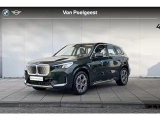 BMW iX1 eDrive20 X-Line / Elektrisch verstelbare + verwarmde voorstoelen / Trekhaak Zwenkbaar / Park