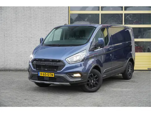 Ford Transit Custom 300 2.0 TDCI L1H1 Trail BJ2022 Lmv 16" (Zwart) | Led | Pdc | Trekhaak | Verwarmd