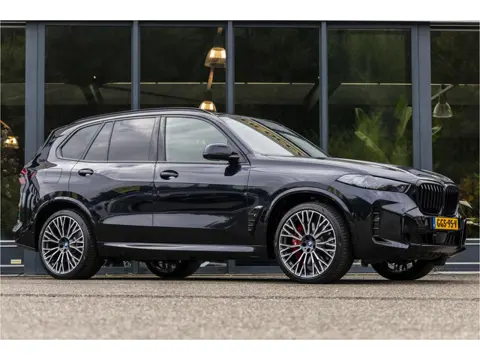 BMW X5 xDrive50e M-Pakket Alcantara hemel (bj 2024)
