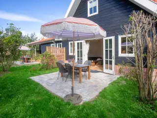 Geschakeld vakantiehuis met tuin en terras op een centrale plek
