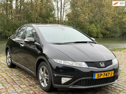 Honda Civic 1.4 Sport 2e eigenaar dealer onderhouden airco elektrische ramen cruise control parkeers