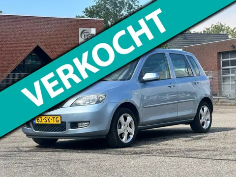Mazda 2 1.4 Touring Airco*Trekhaak*NAP*Parkeersensoren*LM velgen*APK*2e eigenaar*