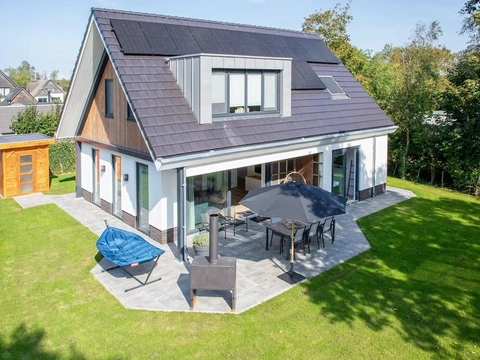 Luxe modern vakantiehuis vlakbij de duinen in het bos
