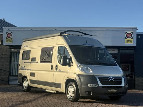 Pössl 2 Win Euro 5 150 pk buscamper in nieuwstaat dwarsbed uitzwenkbare fietsendrager luifel airco c