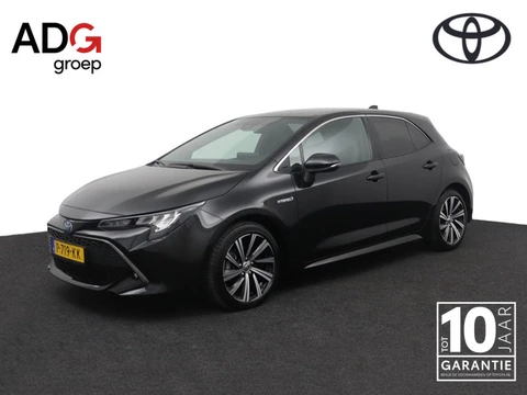 Toyota Corolla 1.8 Hybrid Dynamic | Stoelverwarming | Keyless | Leder-stof bekleding | Trekhaak |