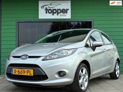 Ford Fiesta 1.25 Ghia|D-riem v.v.|Trekhaak|Airco|Elektr.ramen|LM-Velgen|Nieuwe APK|