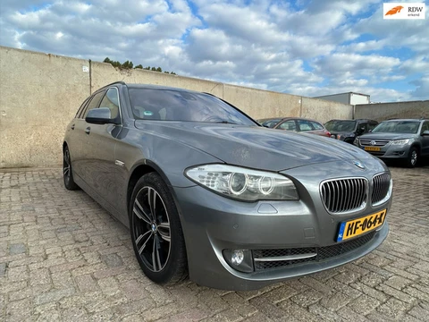BMW 5-serie Touring 535xd High Executive zijschade