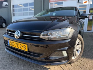 Volkswagen Polo 1.0 TSI Comfortline 5 drs in automaat en parkeersensoren en trekhaak en navigatie en