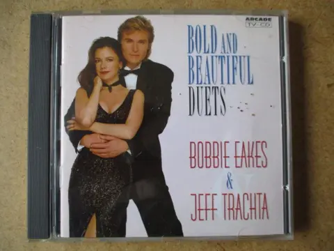 Bobbie eakes and jeff trachta adv8274