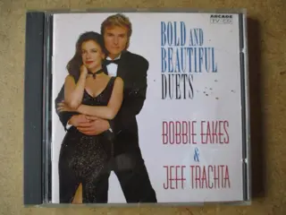 Bobbie eakes and jeff trachta adv8274