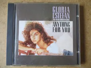 Gloria estafan and miami sound machine adv8275