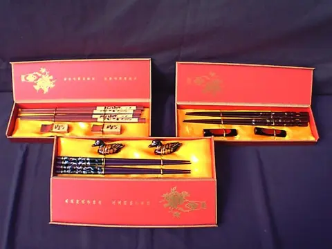 3 sets (12 st.)chinese eetstokjes,nw,incl. eetstokjelegger