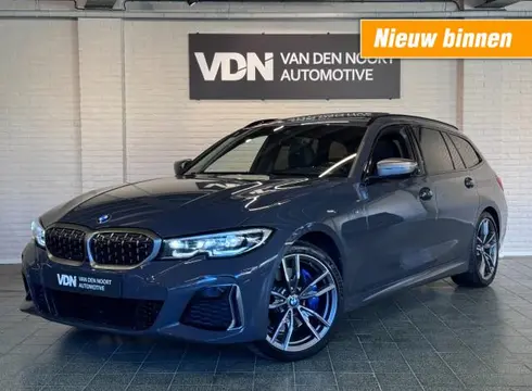 BMW 3-SERIE Touring M340i xDrive Pano HUD H/K 360 Memory Trekhaak 19''