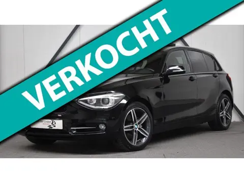 BMW 1-serie 118i SPORT edition l Dakraam l Xenon l Vol leder l Groot Navi