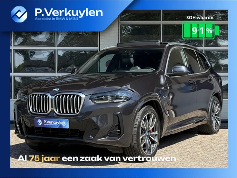 BMW X3 xDrive30e M SPORT | SPORTREMMEN ROOD | PANORAMA | TREKHAAK | ADAPTIEF ONDERSTEL | CAMERA | KE