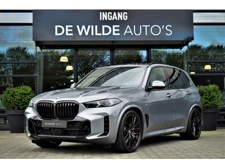 BMW X5 xDrive50e M-sport Pano 4-wielsturing SoftClose Trekhaak Harman/Kardon Carbon