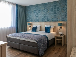 Senior suite met Kingsize bed in gezellig familiehotel