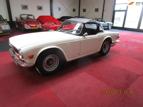 Triumph TR6 in nieuwstaat is boddy off gerestaureerd