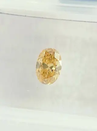 1 pcs Diamant - 0.51 ct - Ovaal - fancy intens bruinachtig