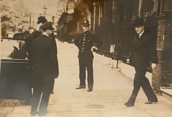 Associated Press - Police Guard for Home Secretary Samual