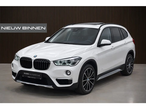 BMW X1 sDrive20i Orange Edition II | Harman Kardon | Panoramadak | Head-Up Display | Trekhaak | Stoe