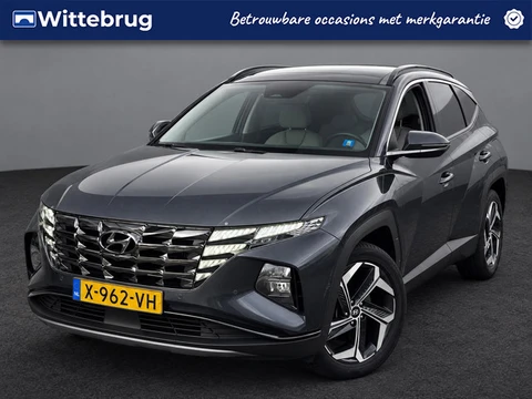 Hyundai Tucson 1.6 T-GDI HEV Premium Sky OPEN DAK | LEDER MET LICHT INTERIEUR | 19 INCH | TREKHAAK |