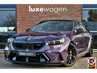 BMW 5 Serie Touring M5 | Daytona-Violett | Ceramic | 22"Korbach | Akrapovic | Pano | Trekhaak | DA+