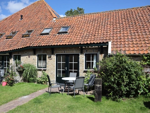 Sfeervol appartement in voormalige boerderij midden in Den Hoorn