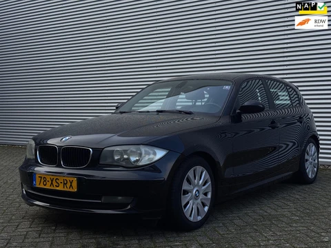 BMW 1-serie 116i High Executive | Airco | Sportstoelen | Elektrische ramen | Cruise control | 2 sleu