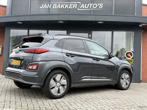 Hyundai KONA EV Limited 64 kWh SoH 100% ✅ Leer ✅ Camera ✅ Stuurverw. ✅ stoelverw ✅CarPlay