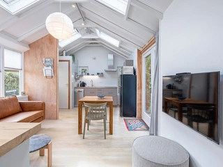 Vrijstaand appartement vlak bij bos en strand met privésauna
