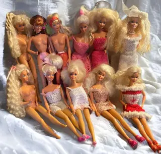 Mattel - 11 Barbie poppen