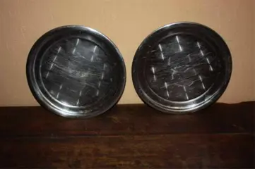 2 mooie zilverkleurige onderborden