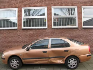 Sloopauto inkoop Den haag MITSUBISHI CARISMA Bouwjaar 1999