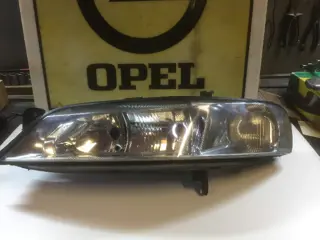 Koplamp Opel Vectra B links 90586848